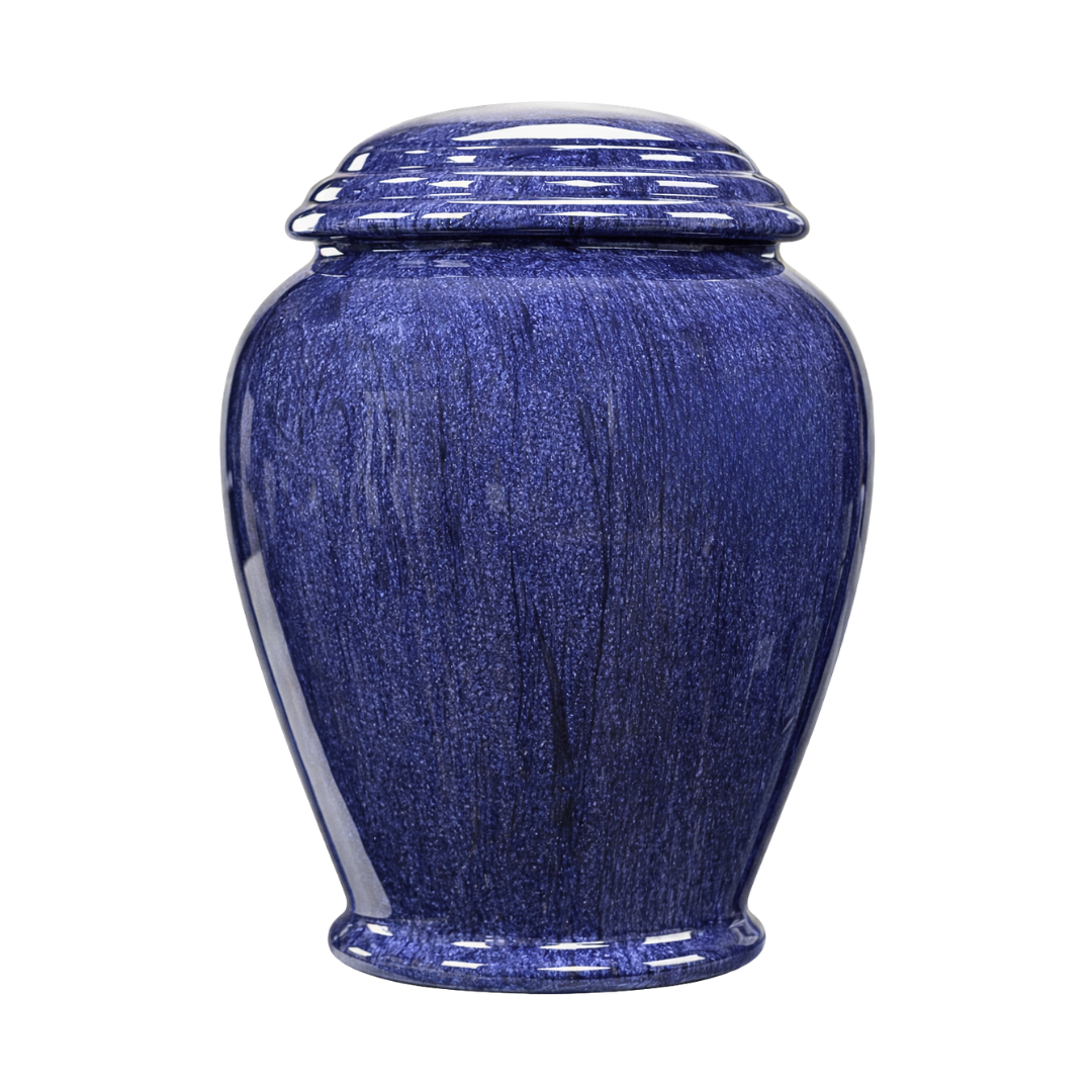 Jollity Blue Marble adult urn with deep denim-blue marble, soft natural veining, and elegant engraved memorial design