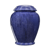 Jollity Blue Marble adult urn with deep denim-blue marble, soft natural veining, and elegant engraved memorial design